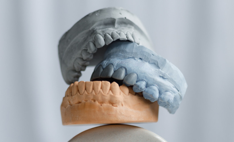 Стираемость зубов, последствия